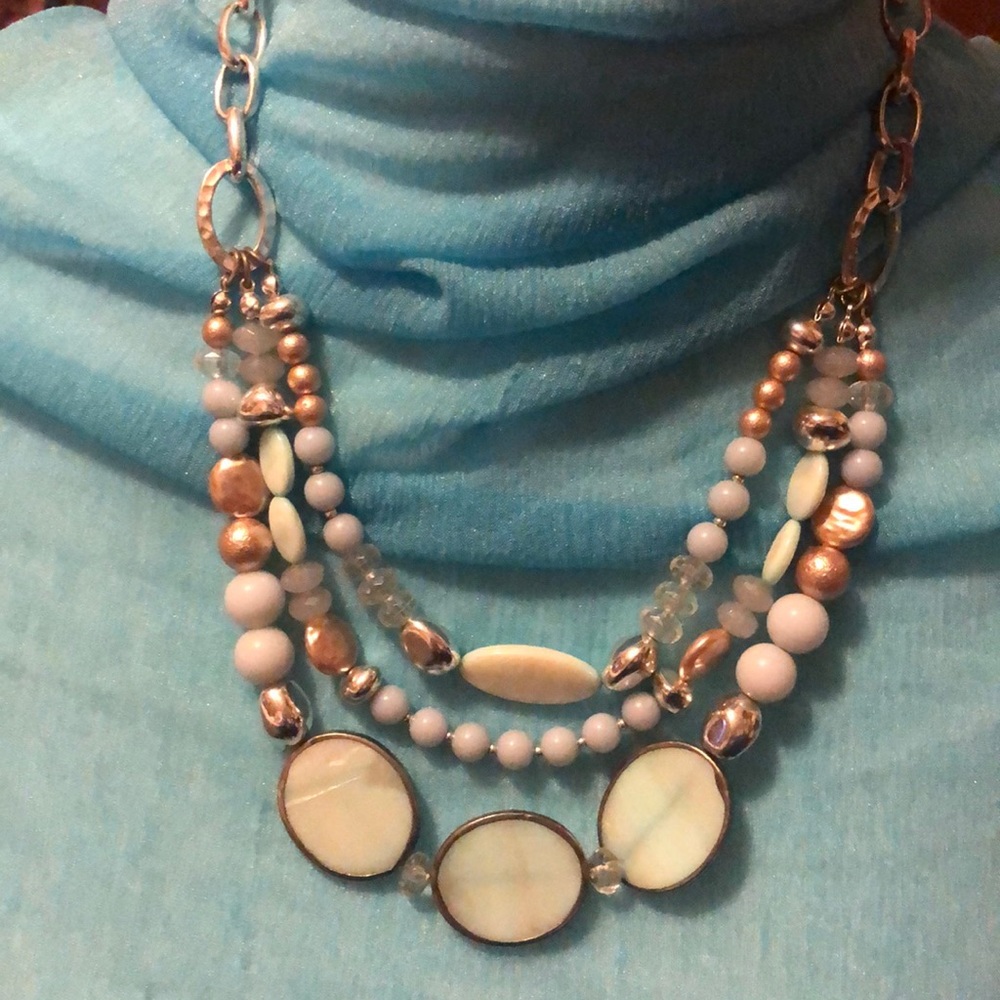 Chico’s triple strand necklace.  Beautiful shell and bead mixed with silver tone
